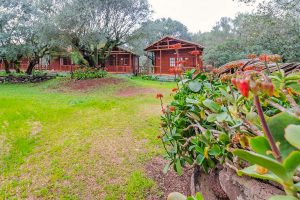 a picture of the greens and little houses at Agriturismo Biriddo in Dorgali east Sardinia