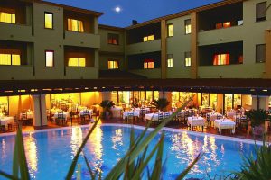 a picture of the terrace and outdoor pool at Hotel Maria Rosaria in Orosei east Sardinia Italy