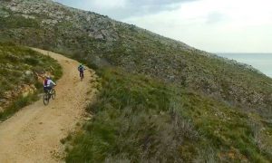 a picture of two mountain bikers in golfo aranci north-east sardinia