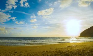 a picture of the sunset at la speranza beach near alghero in north west sardinia