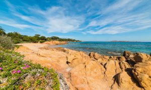 a picture of the shoreline near romazzino beach in costa smeralda sardinia