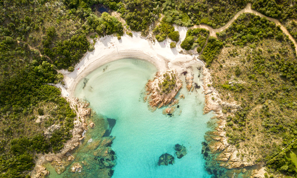 a picture of spiaggia del principe seen from above