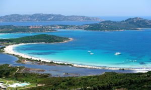 an aerial picture of cala brandinchi in san teodoro sardinia