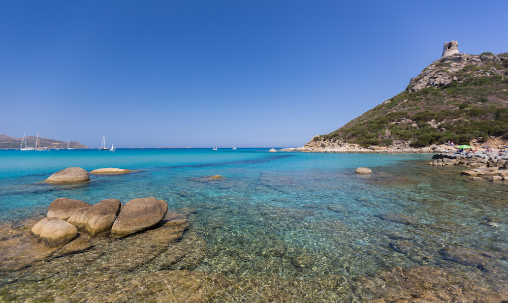 a picture of the beach at putzu idu in west sardinia