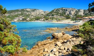 a picture of the beach at Baia Sardinia near Porto Cervo in Sardinia Italy.