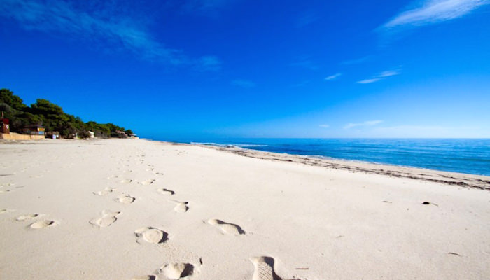 a picture of santa margherita di pula beach