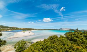 a picture of spiaggia di lu impostu and isola tavolara