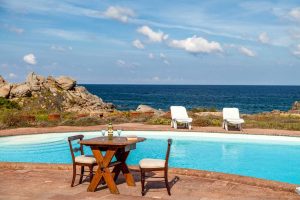 a picture of the outdoor pool at villa Mariu e Amelie in portobello di gallura north sardinia