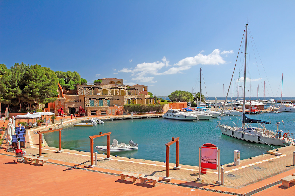 a picture of the colorful harbor of portisco in north-east sardinia italy