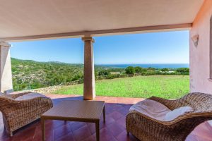 a picture of the views from the terrace at the san pantaleo residence in portisco sardinia