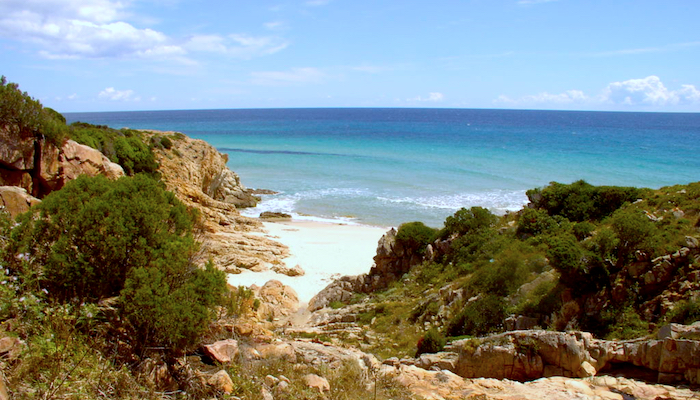 a picture of pinus village beach in santa margherita di pula sardinia