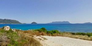 a picture of cala delfino near baia caddinas in golfo aranci