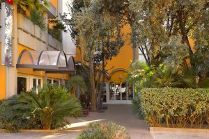 a picture of the entrance to the mistral2 hotel in oristano west sardinia