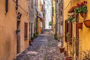 a picture of a cobbled street in Alghero, north-west Sardinia, Italy.