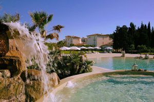 a picture of the sun terrace and outdoor pool at the Tartheshotel in Guspini south-west Sardinia, Italy.