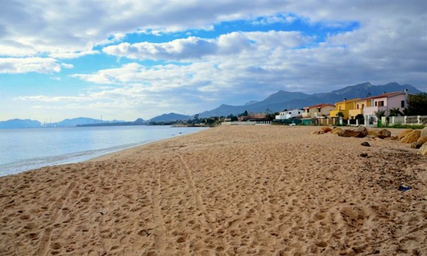 a picture of the beach of frutti d'oro in la maddalena cagliari sardinia