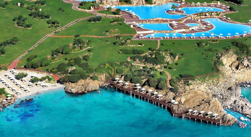 The private beach and swimming pools at the Colonna Resort.