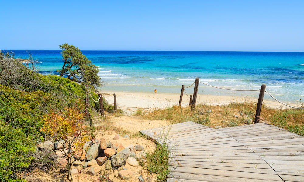 a picture of the entrance to scoglio di peppino beach in cagliari south-east sardinia