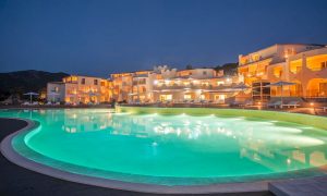 a picture of the large outdoor pool at hotel cala cuncheddi near porto istana in north east sardinia