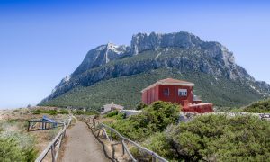 a picture of a house on isola tavolara in north-east sardinia