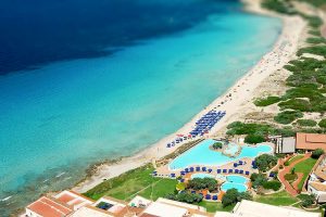 a picture of the private beach at the five-star colonna grand hotel in capo testa north sardinia