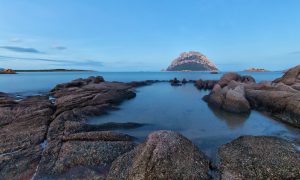 a picture of a natural pool at the beach of Punta Don Diego near Porto San Paolo in north-east Sardinia Italy