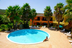 a picture of the outdoor pool at Palau Green Village in north Sardinia, Italy.