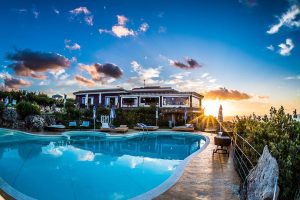 a picture of the pool at the Bajaloglia Resort in Castelsardo Sardinia