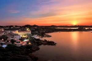 a picture of a nice sunset over Grand Hotel Smeraldo Beach in Baja Sardinia, Costa Smeralda, north-east Sardinia, Italy.