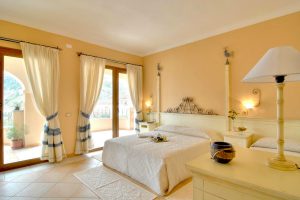 a picture of the colorful interior design of a room at Hotel La Rosa Dei Venti, in Buggerru, south-west Sardinia, Italy.