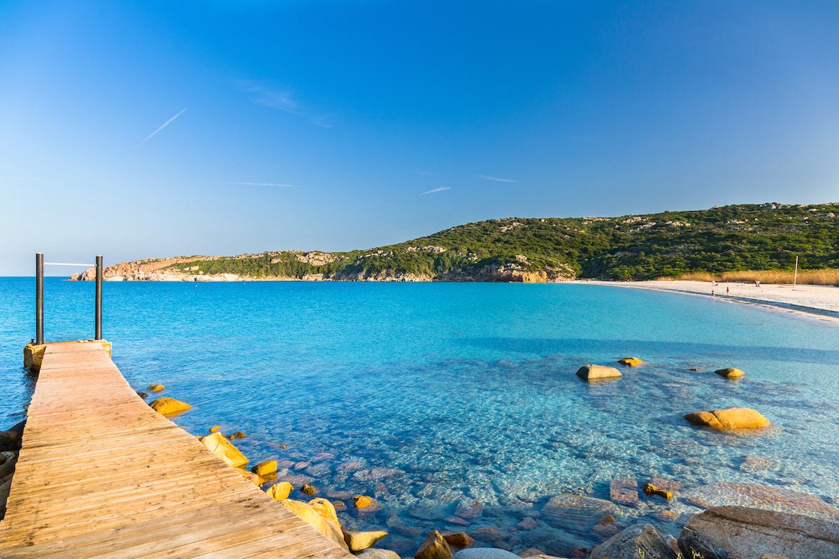 a picture of a boardwalk on the north side of La Marmorata, a beach near Santa Teresa di Gallura, north Sardinia, Italy.
