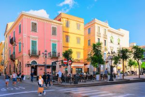 a picture of Corso Umberto in Sardinia, the main street of Olbia where people go shopping at the many boutiques, or go to restaurants, gelaterias and bars.