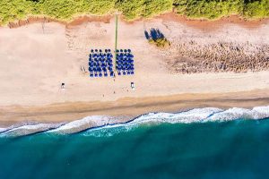 an aerial picture of the private beach at Corte Bianca, a four-star hotel near Tertenia, south-east Sardinia, Italy.