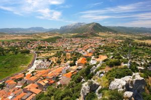 a picture of the landscape surrounding Posada, one of the most ancient villages of Sardinia, Italy.