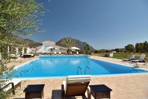 a picture of the large outdoor pool at the Sa Iba Resort in Tertenia, south-east Sardinia, Italy.