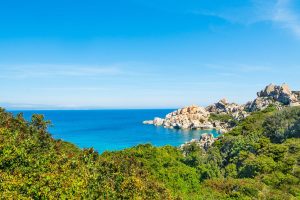 a scenery of rocky shores, deep blue water and sweeping views in Capo Testa, north Sardinia, Italy.