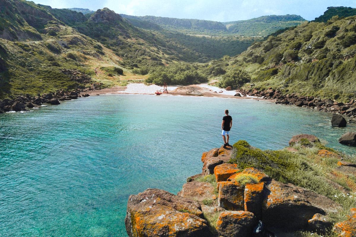 a small cove near Castelsardo in north Sardinia, Italy.