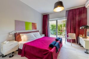 a modern room at Hotel Residence Hibiscus in the seaside village of La Caletta, in east Sardinia, Italy.