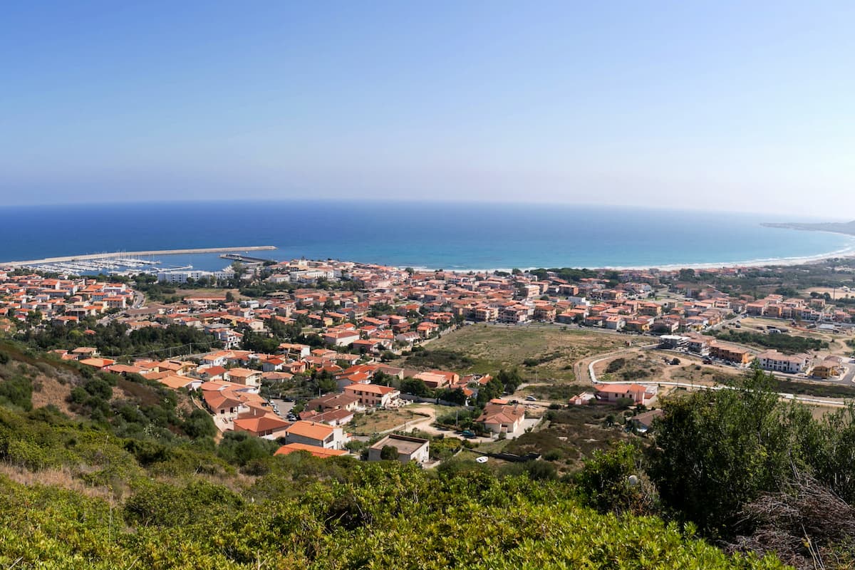a panorama of La Caletta, a small seaside village with a harbour in east Sardinia, Italy.