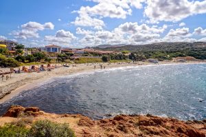 a summer day on a beach near Isola Rossa, in north Sardinia, Italy.