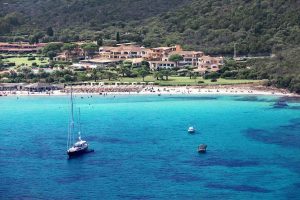 stunningly blue water and a white sandy beach at Hotel Abi d'Oru, Golfo di Marinella, Emerald Coast, Sardinia. Italy.