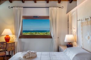 a hotel room with fantastic views of the sea in Golfo di Marinella, Costa Smeralda, north-east Sardinia, Italy.