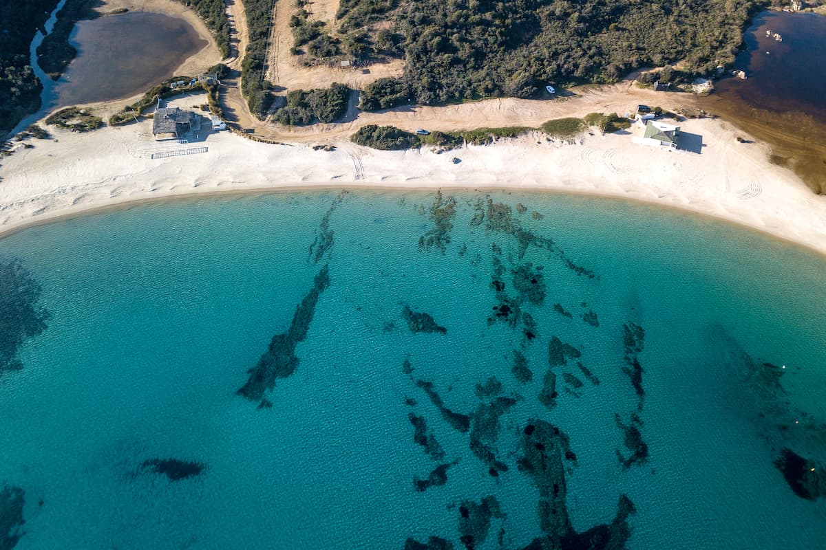 an aerial view of Spiaggia Bianca near Golfo Aranci, Sardinia, Italy.