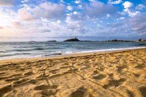 sunset at Spiaggia di Nora, a beach near Pula in south Sardinia Italy.