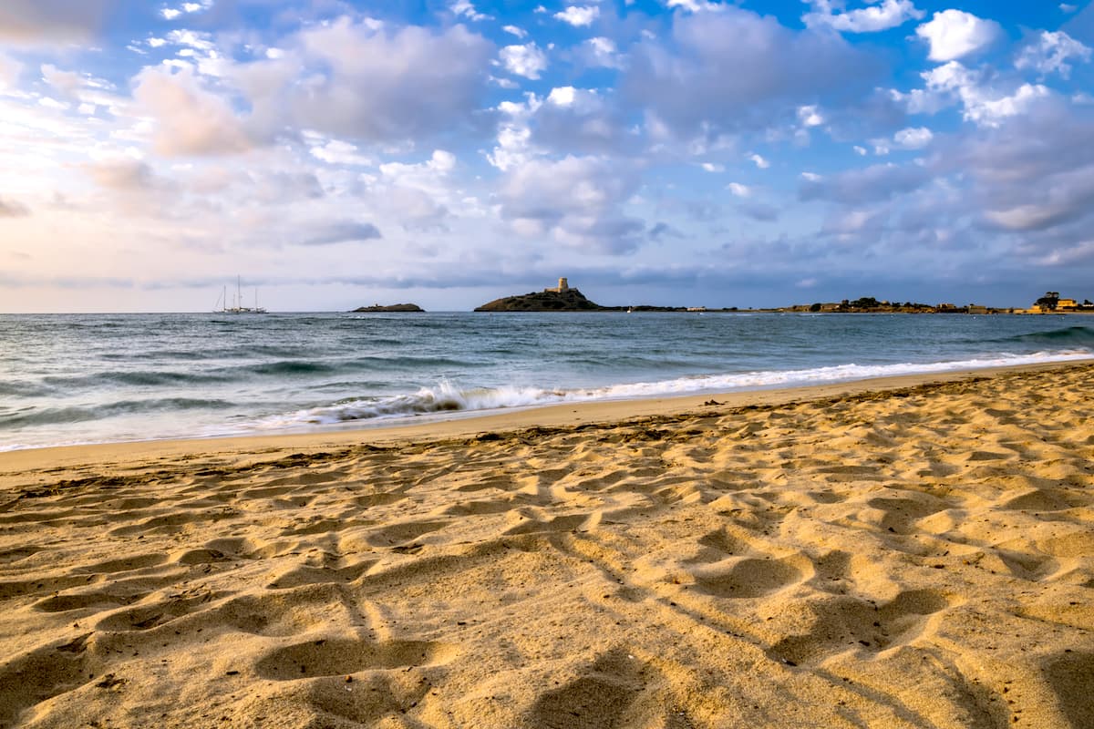 sunset at Spiaggia di Nora, a beach near Pula in south Sardinia Italy.