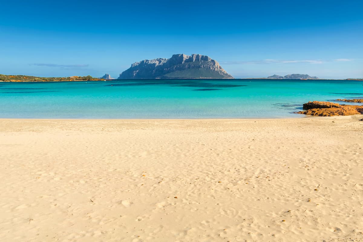 A view from the beach of Porto Istana, in the province of Olbia-Tempio, north-east Sardinia. In the background, Isola Tavolara.