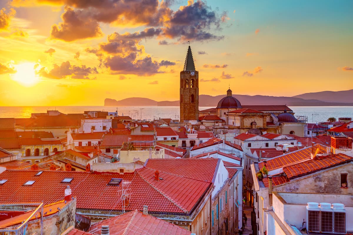 Sunset over Alghero, in north-west Sardinia, Italy.