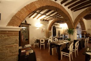inside a restaurant named Officina del Gusto, in the historic centre of Olbia, north-east Sardinia, Italy.