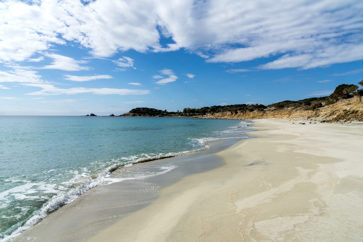 The sandy shores of Spiaggia Is Piscadeddus on a quiet day, near Villasimius, south Sardinia, Italy.