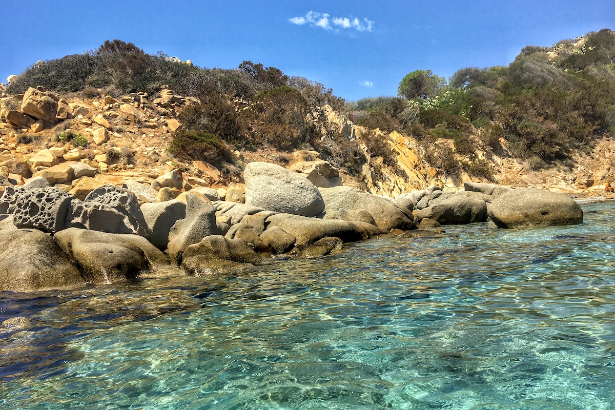 Spiaggia di Is Traias offers good snorkeling spots on both sides of the beach